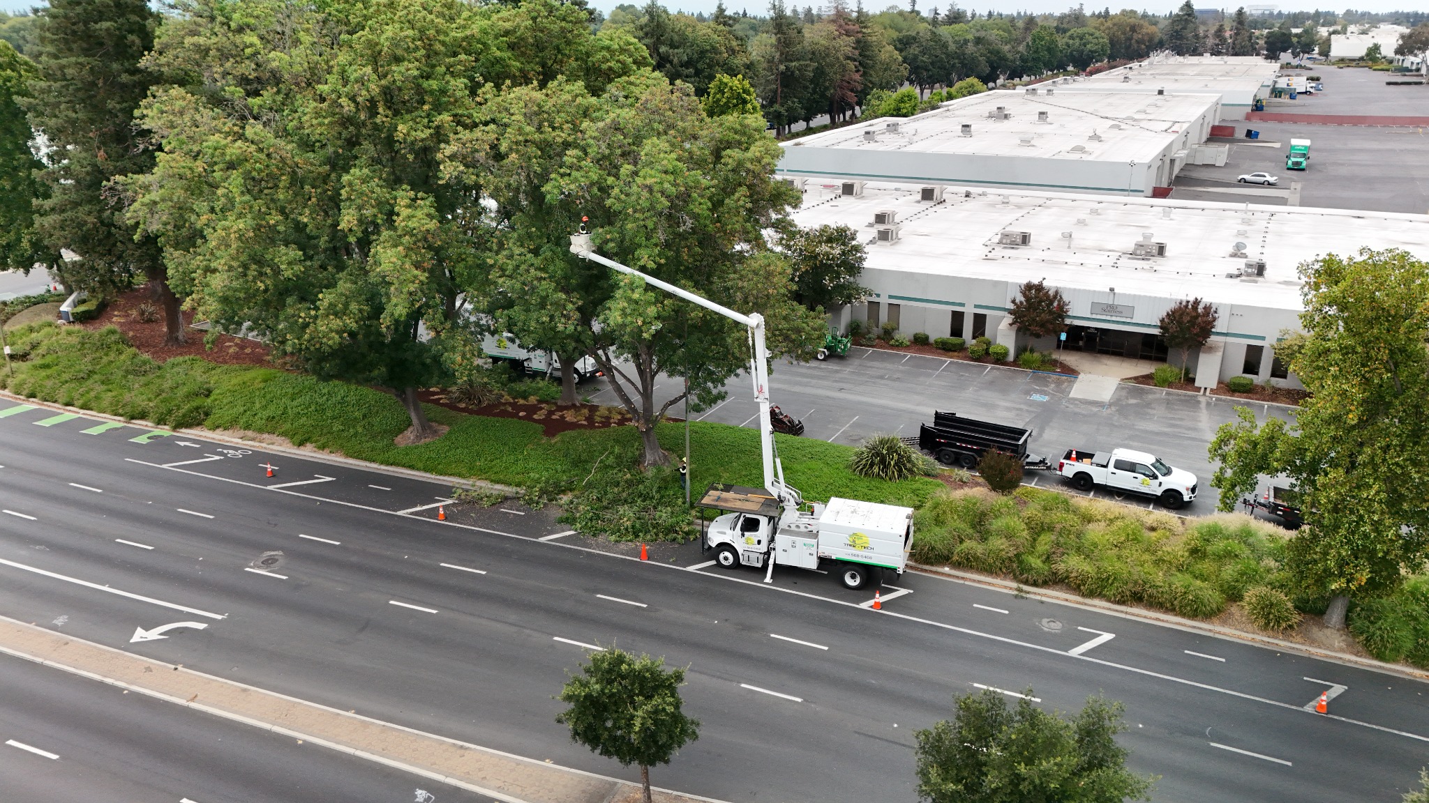 Aerial equipment and our team at work beside a commercial property